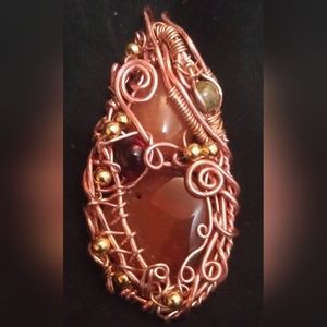 Handwrapped carnelian pendant